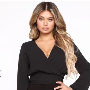 Black “Little White Lies” long sleeve top